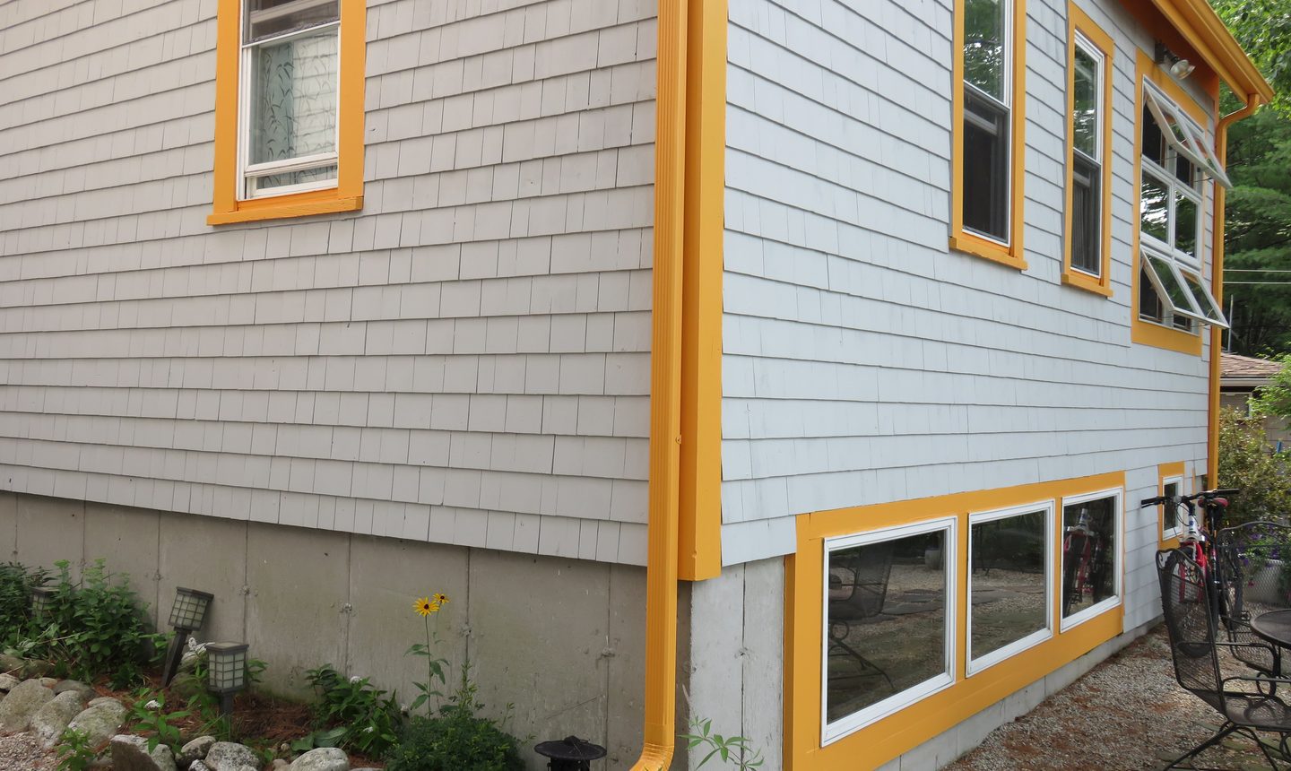 Residential Home Featuring Orange Gutters